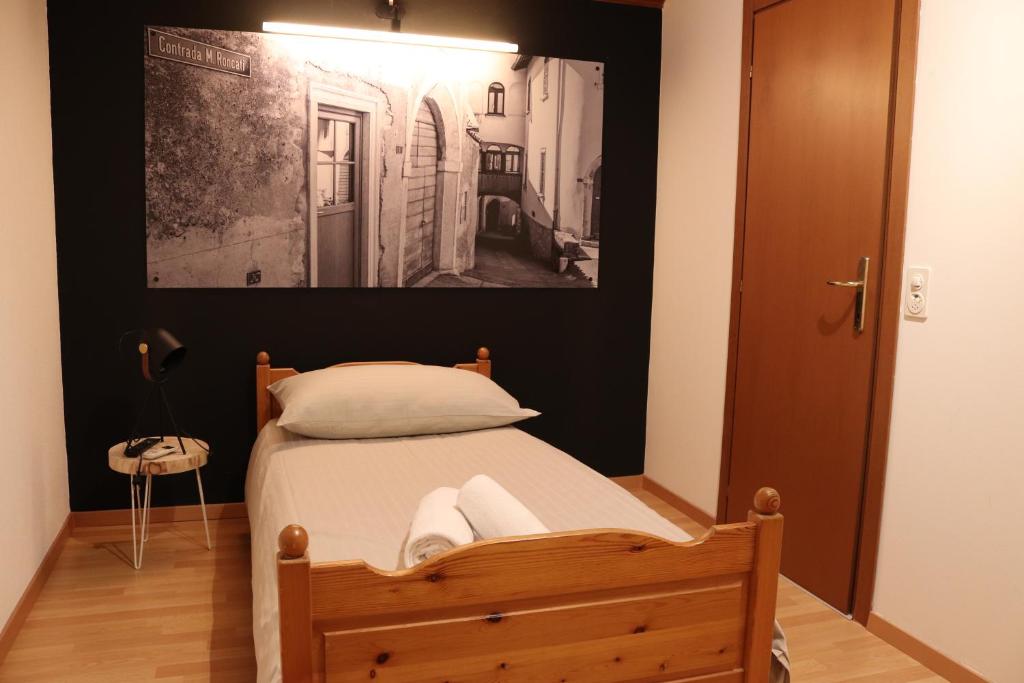 Postel nebo postele na pokoji v ubytování Borgovecchio Albergo