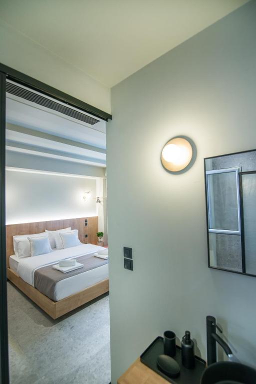 Posteľ alebo postele v izbe v ubytovaní Metis Urbane Living Spaces