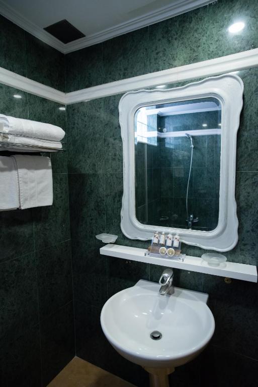 Koupelna v ubytování Byzantino Hotel