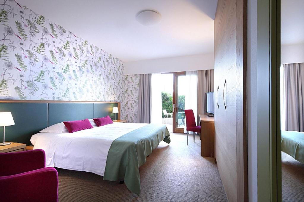 Posteľ alebo postele v izbe v ubytovaní Relais Le Betulle