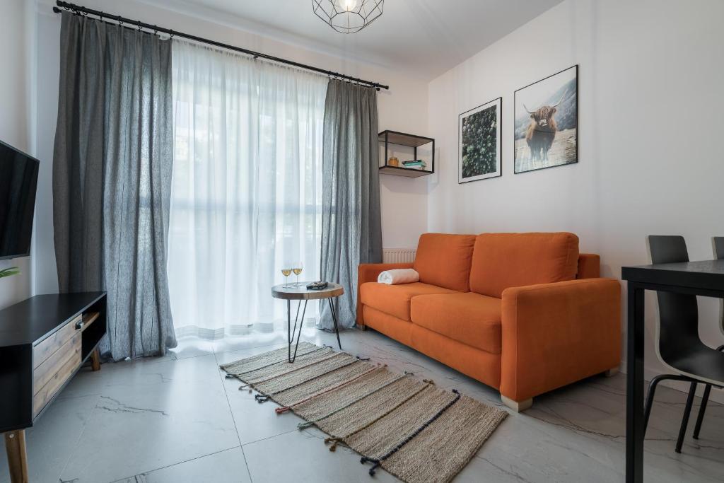 Posedenie v ubytovaní 1555 Apartments I z miejscem parkingowym