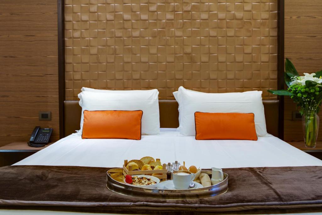 Łóżko lub łóżka w pokoju w obiekcie Solo Experience Hotel