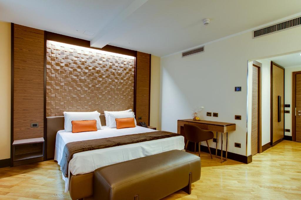 Łóżko lub łóżka w pokoju w obiekcie Solo Experience Hotel