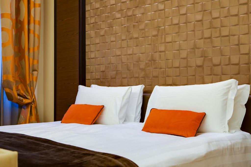 Łóżko lub łóżka w pokoju w obiekcie Solo Experience Hotel