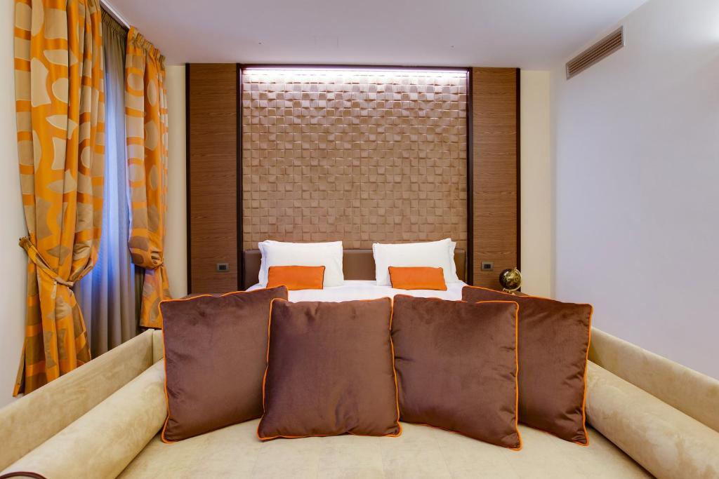 Łóżko lub łóżka w pokoju w obiekcie Solo Experience Hotel