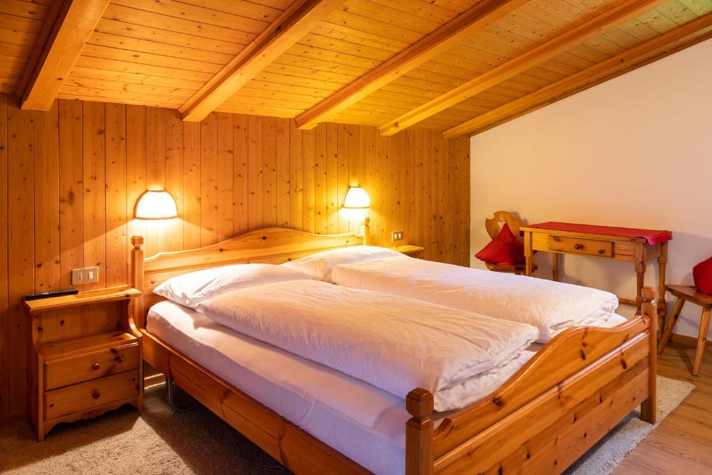 Postel nebo postele na pokoji v ubytování Garni Juri