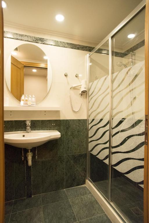 Koupelna v ubytování Byzantino Hotel