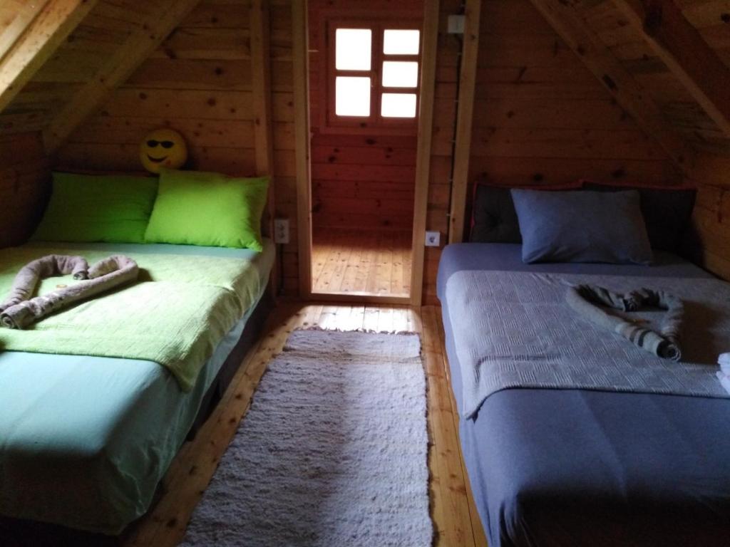 Postel nebo postele na pokoji v ubytování Vikendice Mijajlović 1