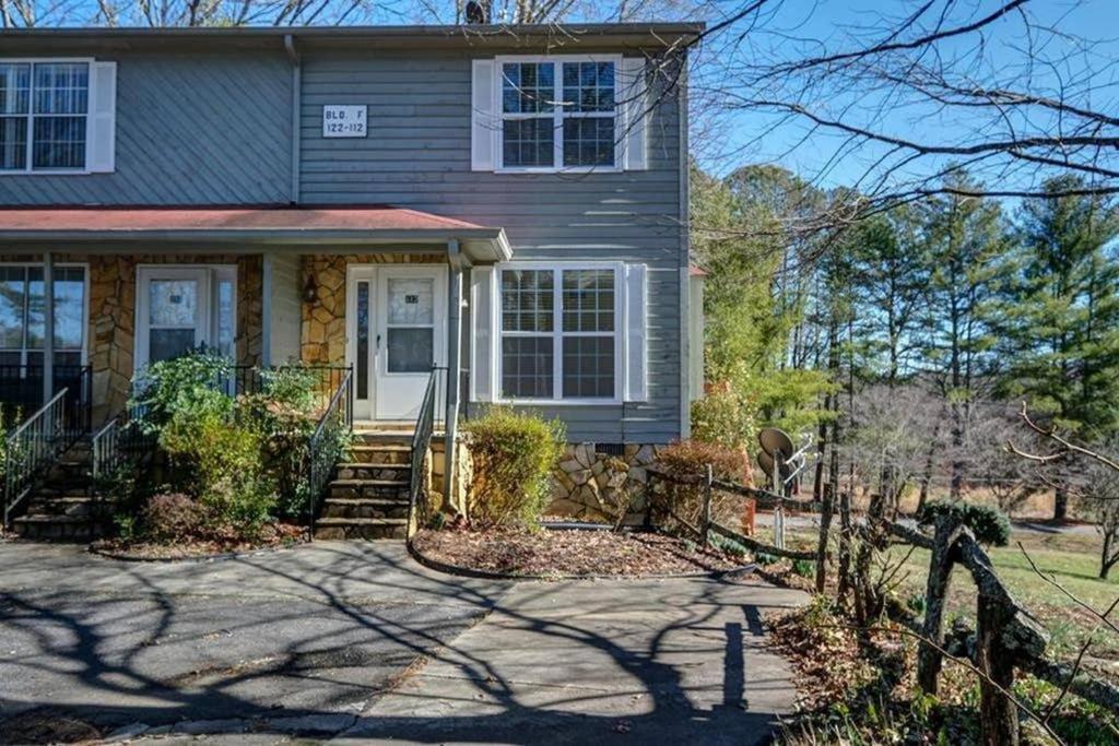 a house with a white door and a porch at Magnificent views in Murphy in Murphy