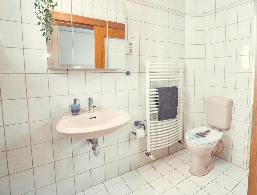 Koupelna v ubytování Auberge Leipzig
