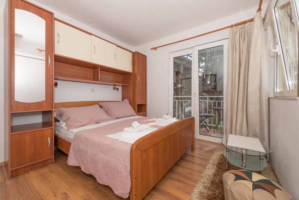 Posteľ alebo postele v izbe v ubytovaní Villa Vanja