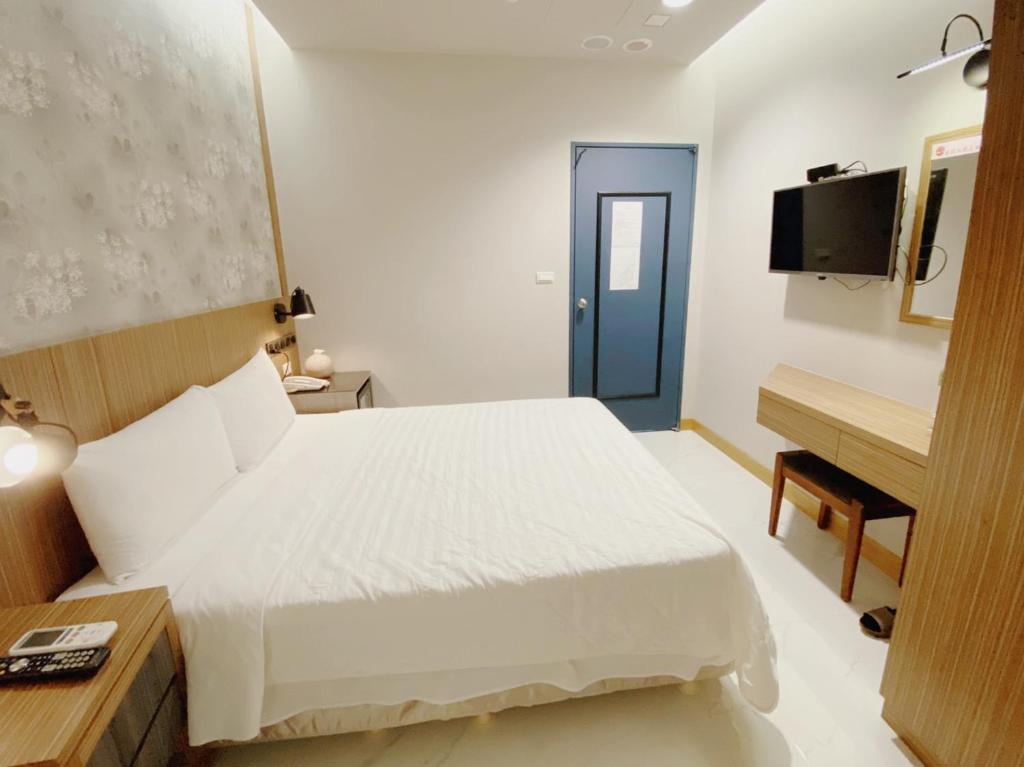 TV a/nebo společenská místnost v ubytování H Hotel