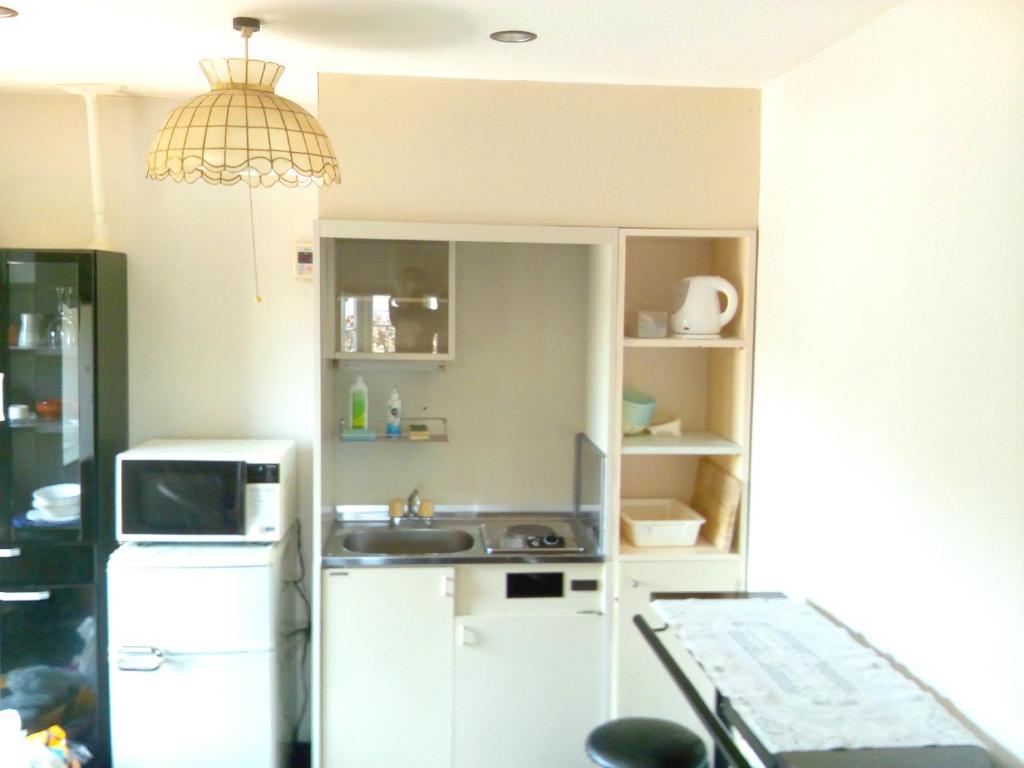Cucina o angolo cottura di J-Garden