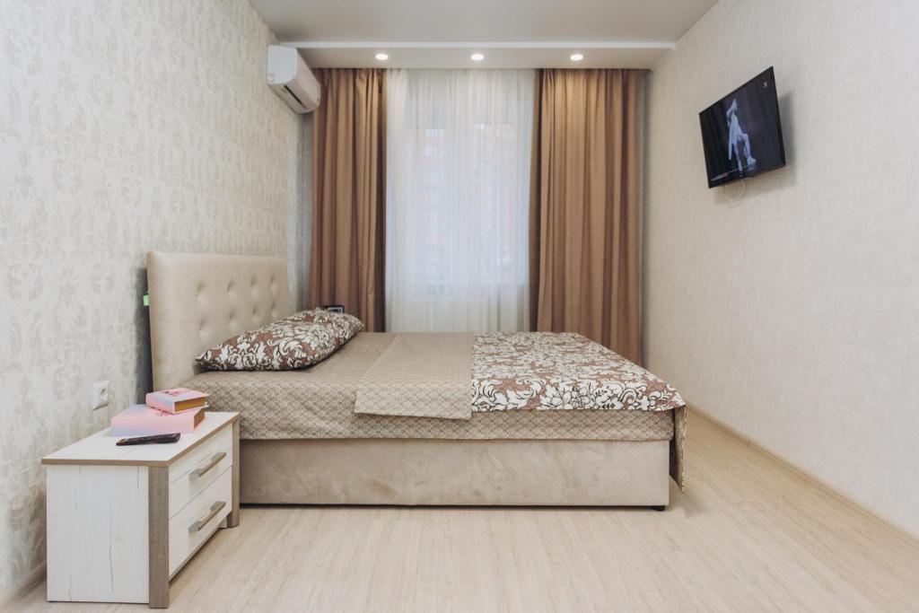 Posteľ alebo postele v izbe v ubytovaní Luxe apart-hotel near Lavina New Building 1 floor