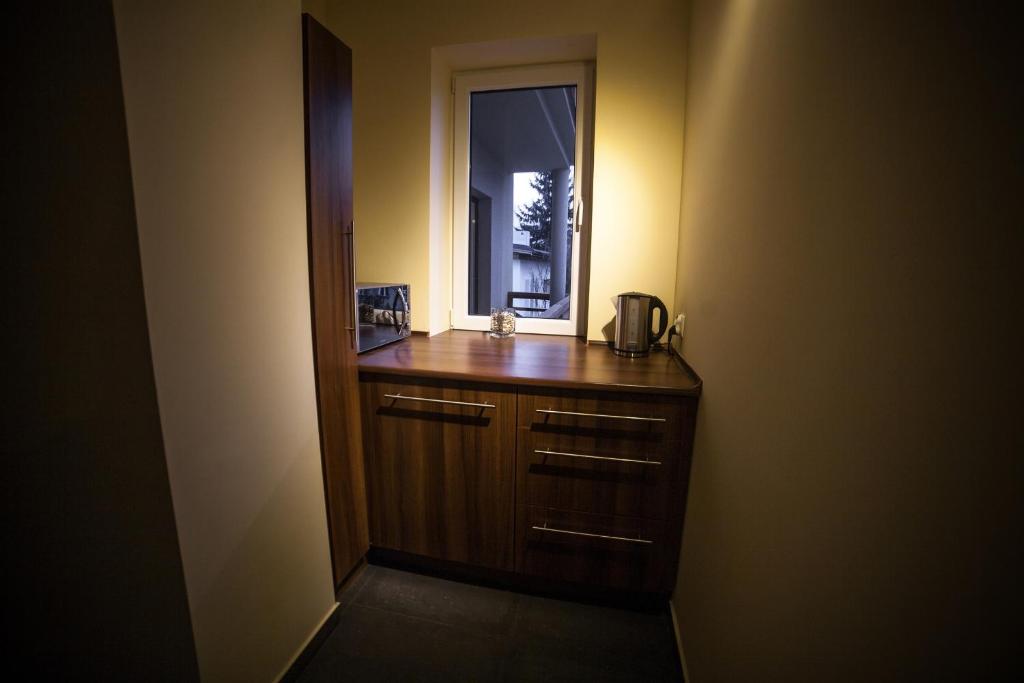 Kuchyňa alebo kuchynka v ubytovaní Rezydencja Pod Ochorowiczówką B&B