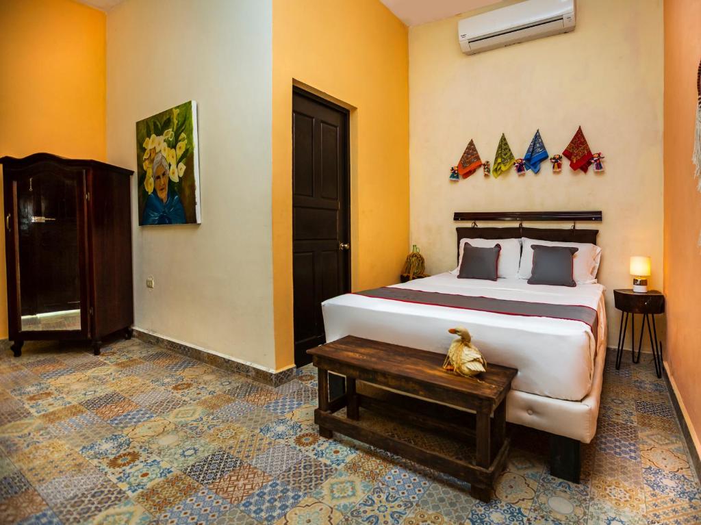 Postel nebo postele na pokoji v ubytování Casa Aluxes Hotel