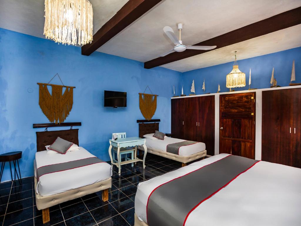 Postel nebo postele na pokoji v ubytování Casa Aluxes Hotel