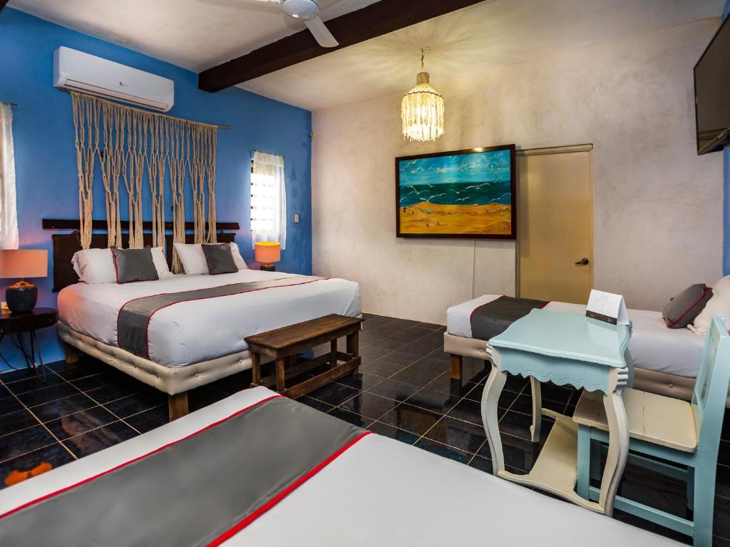 Postel nebo postele na pokoji v ubytování Casa Aluxes Hotel