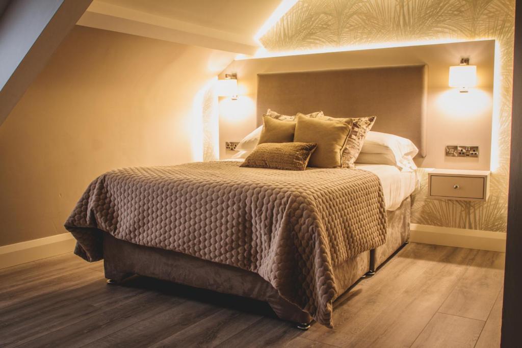 Postel nebo postele na pokoji v ubytování Barr Na Sraide Inn