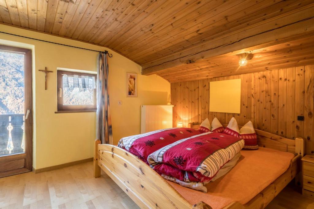Postel nebo postele na pokoji v ubytování Untervernatsch Fewo Enzian