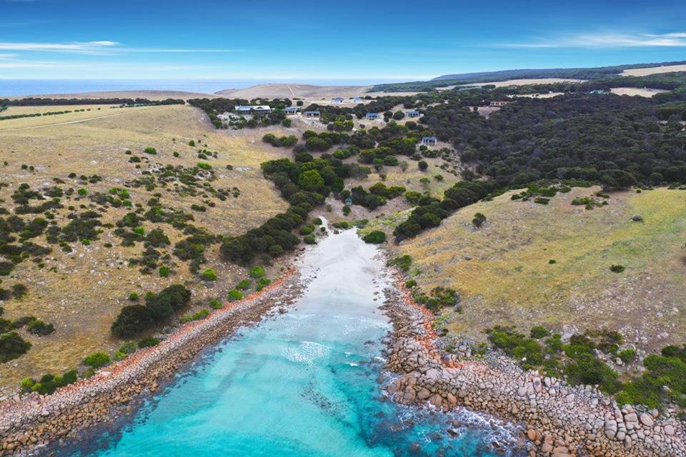 an aerial view of a river with blue water at Sea Dragon Kangaroo Island in Penneshaw