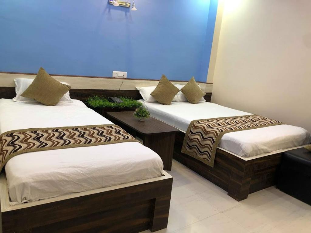 Postel nebo postele na pokoji v ubytování Yara Hotel