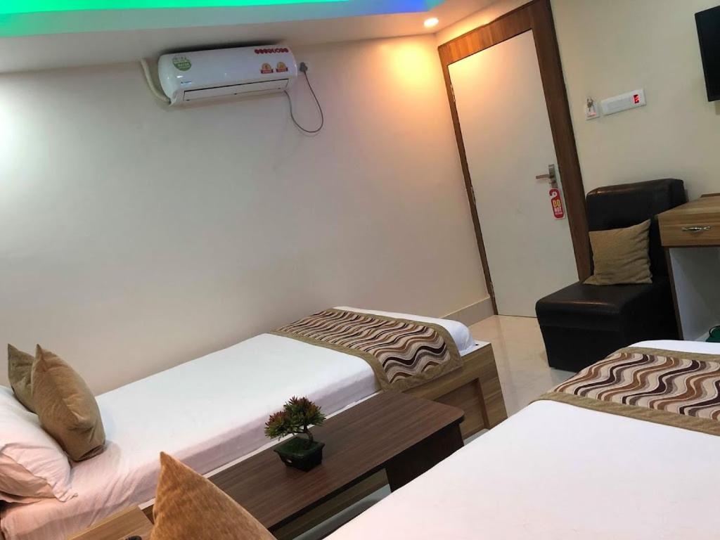 Postel nebo postele na pokoji v ubytování Yara Hotel