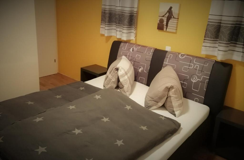 Postel nebo postele na pokoji v ubytování Hausboot MS Donautal