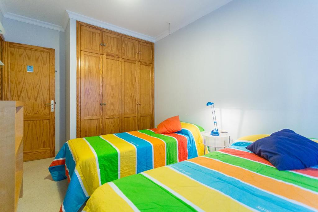 Postel nebo postele na pokoji v ubytování Comfortable Apartment in Salinetas Beach.
