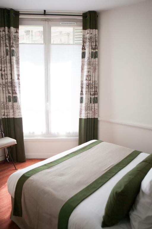 Cama o camas de una habitación en Hotel La Manufacture