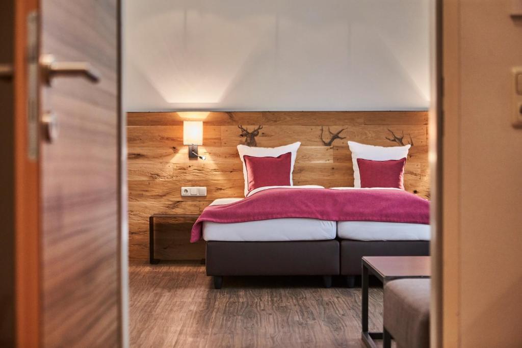 Postel nebo postele na pokoji v ubytování Hotel Schachner