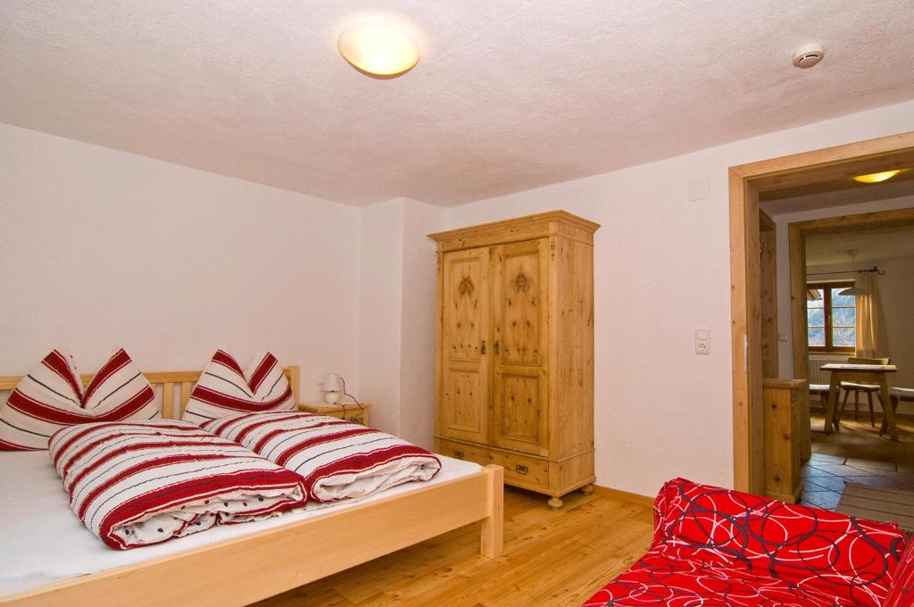 Łóżko lub łóżka w pokoju w obiekcie Weberstube Weberhaus Zollhaus Zollstöckl