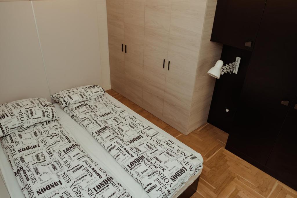 Postel nebo postele na pokoji v ubytování Opera 1
