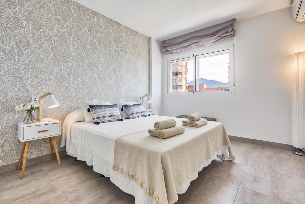 Postel nebo postele na pokoji v ubytování Sur Suites Perla 6