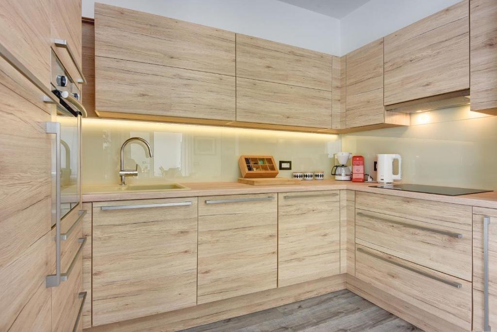 Kuchyň nebo kuchyňský kout v ubytování Villa Sunce