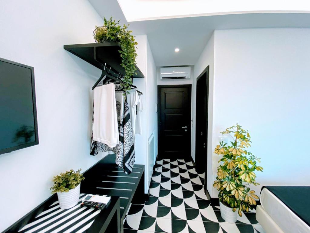 TV a/nebo společenská místnost v ubytování NeroBianco B&B Sorrento
