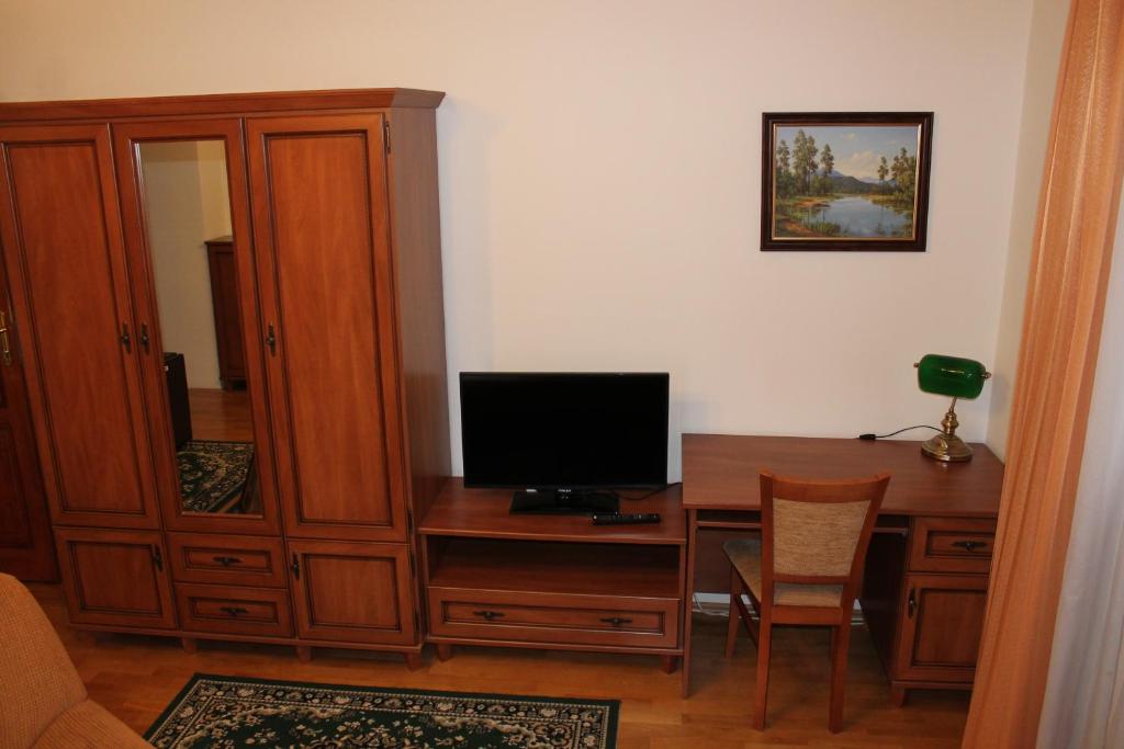 TV a/nebo společenská místnost v ubytování Vila Bellevue