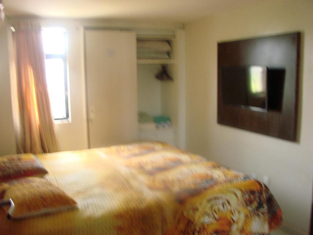  Apartamento em prédio Beira Mar