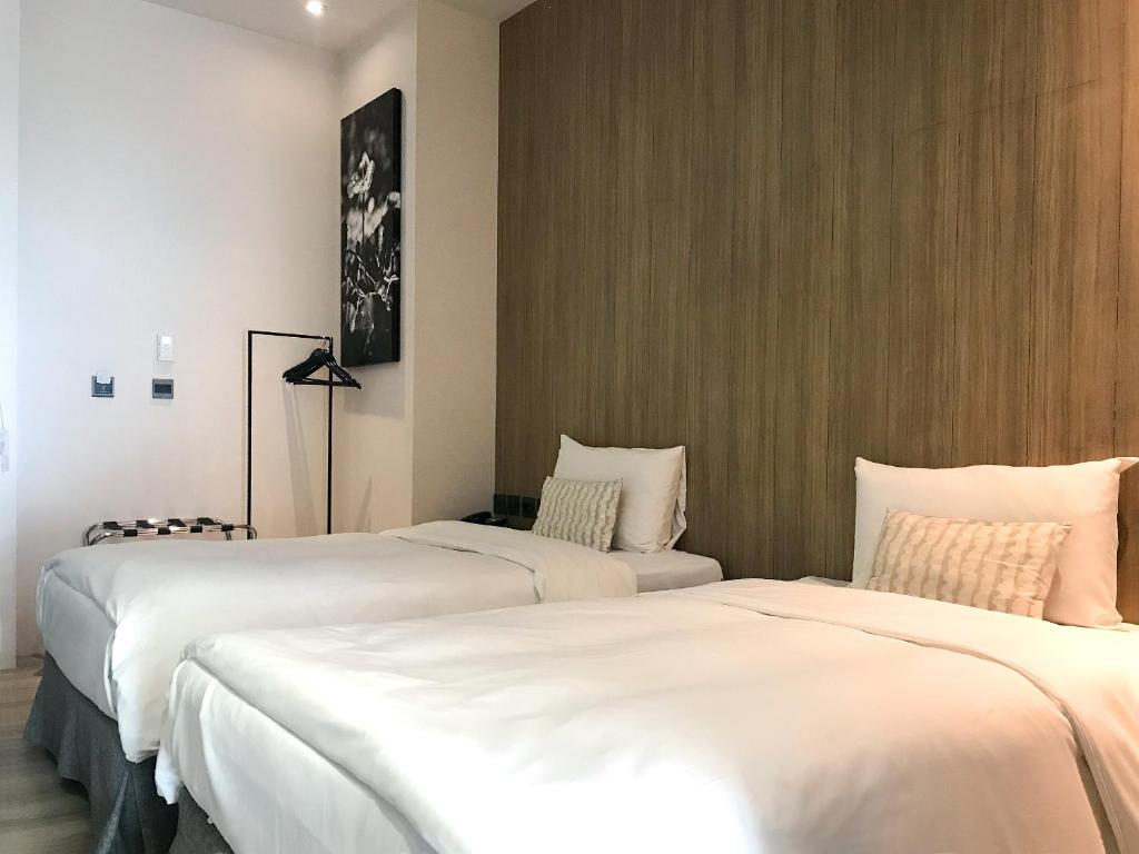 Voodi või voodid majutusasutuse Hotel Day Plus Teascape toas