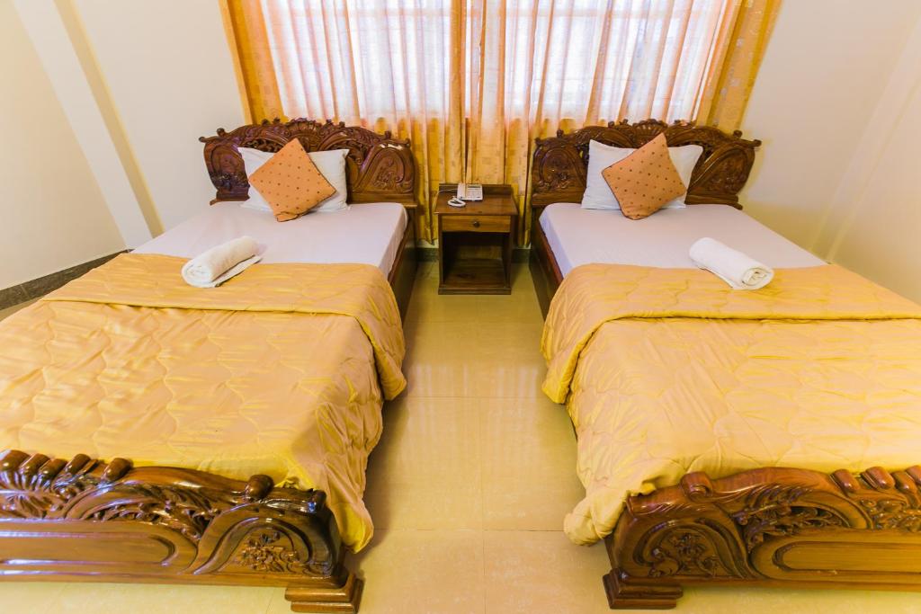 Postel nebo postele na pokoji v ubytování Star Hotel