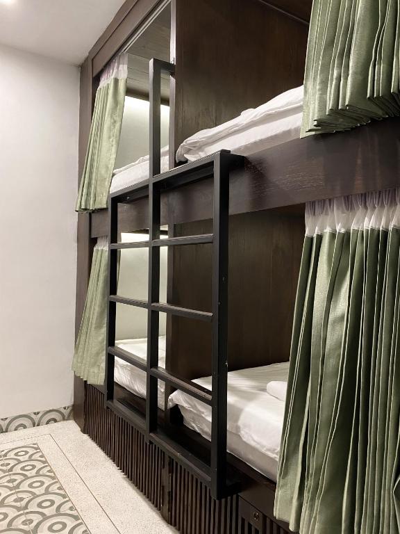 Postel nebo postele na pokoji v ubytování Aborest Tropical Hostel