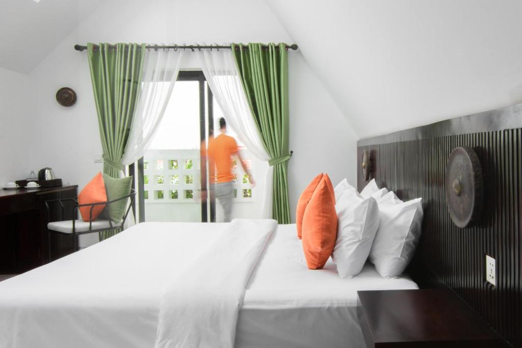 Postel nebo postele na pokoji v ubytování Aborest Tropical Hostel