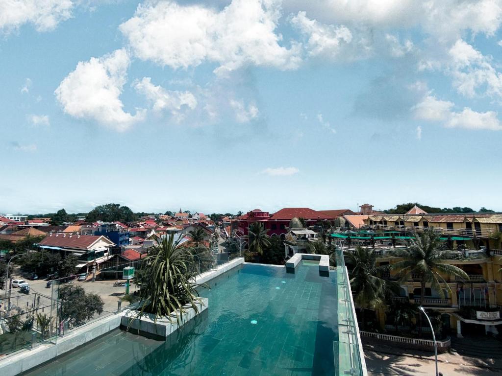 a view of a swimming pool from a resort at Aborest Tropical Hostel in Siem Reap