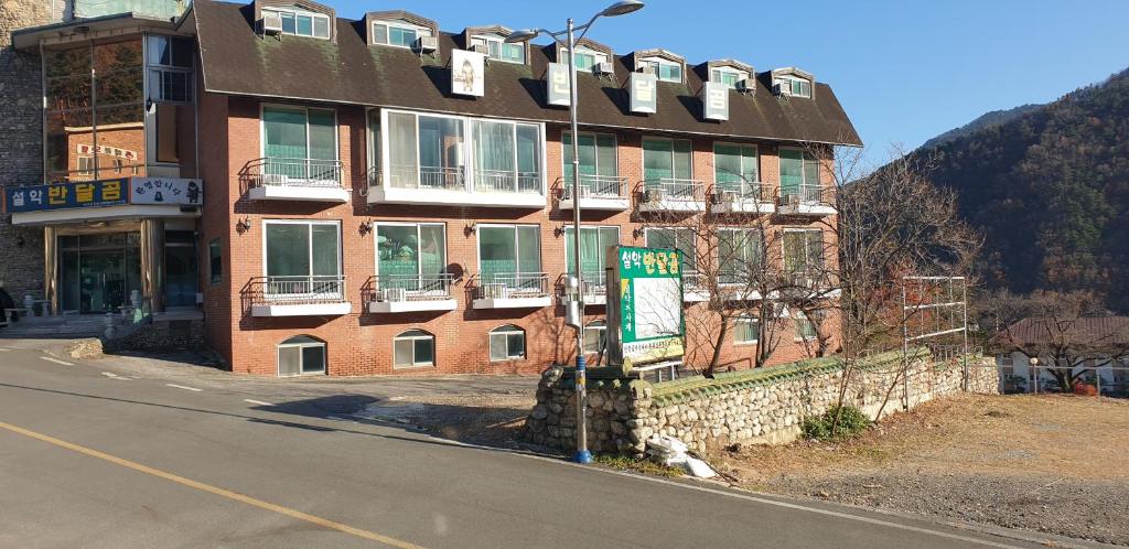 a building on the side of a street at Seoraksan BanDalGom in Sokcho