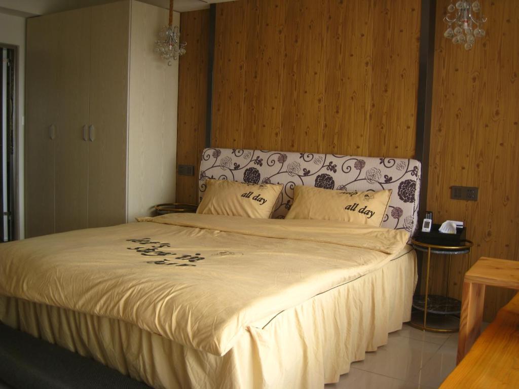 Voodi või voodid majutusasutuse Jiji Wu Homestay toas