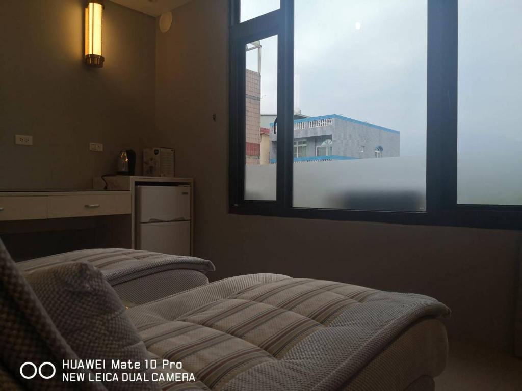 Istumisnurk majutusasutuses Jiji Wu Homestay