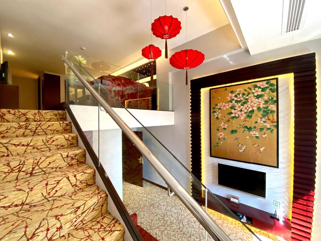 TV a/nebo společenská místnost v ubytování Hotel Metropole