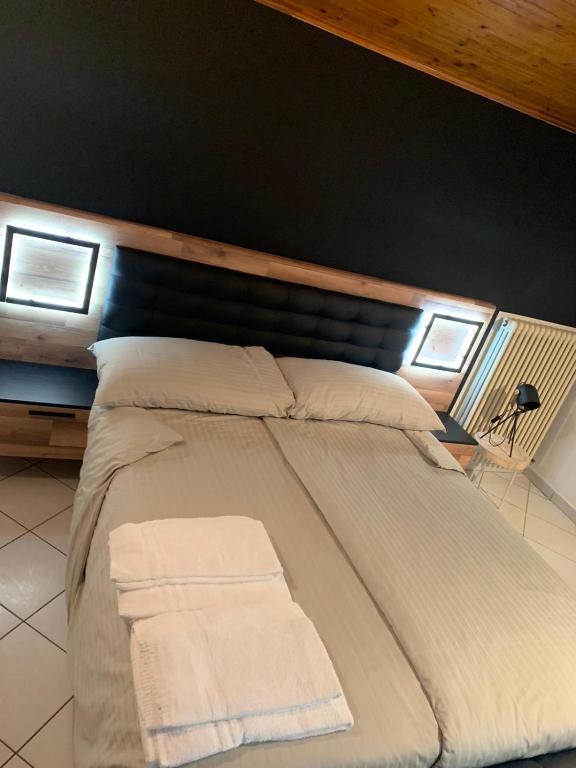 Postel nebo postele na pokoji v ubytování Borgovecchio Albergo
