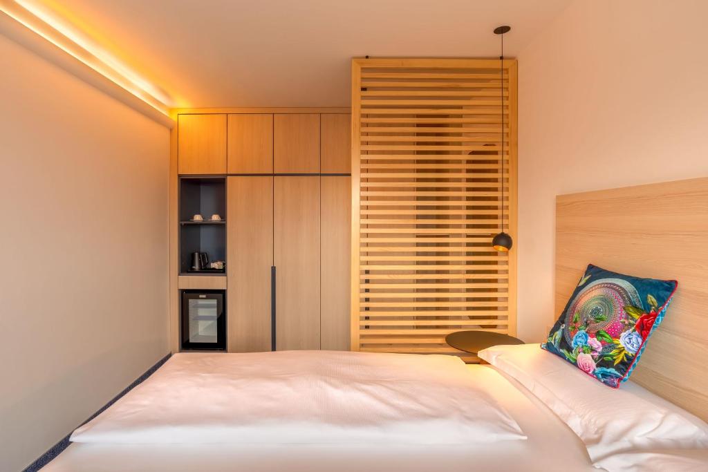 Postel nebo postele na pokoji v ubytování Hotel Bei Gretel, Wellness & Ayurveda