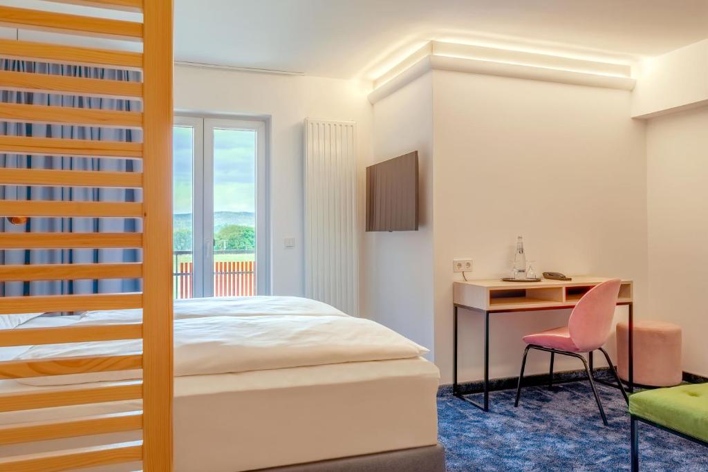 Postel nebo postele na pokoji v ubytování Hotel Bei Gretel, Wellness & Ayurveda